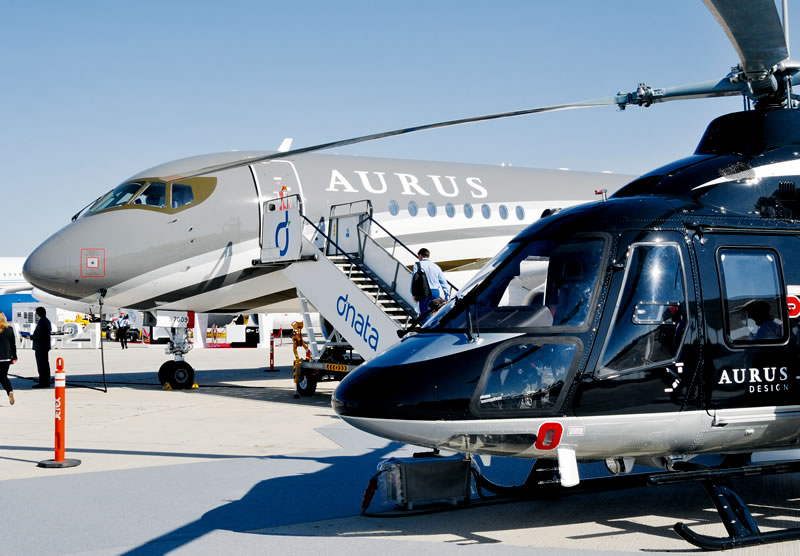 Члены семейства VIP-транспорта Aurus: бизнес-джет на базе Sukhoi Superjet 100 и вертолет &#171;Ансат&#187;.